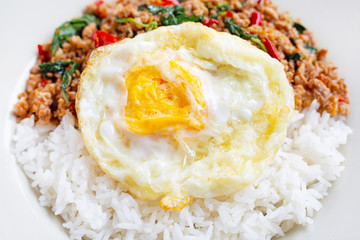 Rice topped with stir-fried pork with holy basil and fried egg