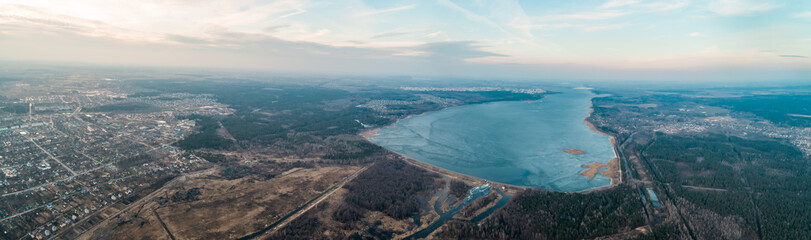 Large panorama of the village and the pond under the blue sky? from above