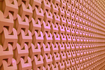 Diminishing Perspective of a Modern Building Decorative Facade in Pink Color