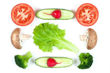 Ingredients for homemade pizza on white background. Top view. Ingredients for salad, slices mushrooms, slices tomatoes, cucumbers, broccoli and salad . Healthy food conception