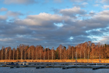 Small boats at the pier on a sunny day
