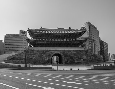Seoul, South Korea - March 2018: Namdaemun gate, buildings background on a beautiful day. Black and white.