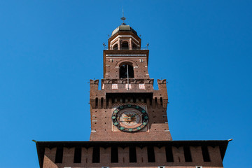 Fototapeta premium Milan, Italy: the Torre del Filarete, the central tower of the Sforza Castle (Castello Sforzesco), built in the 15th century by Francesco Sforza, Duke of Milan, now housing several museums