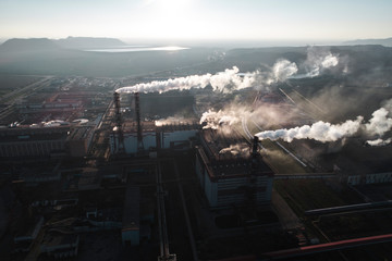 production of potash fertilizers, smoke from pipes creates pollution. shot by drone