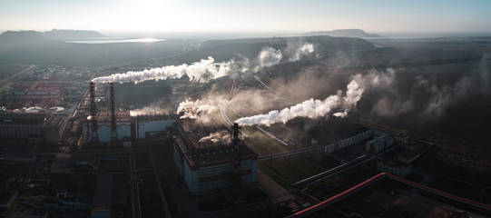 production of potash fertilizers, smoke from pipes creates pollution. shot by drone