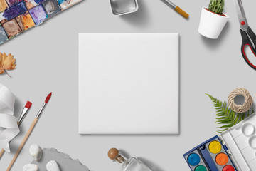 white square canvas mockup with various art objects