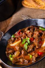 classic beef goulash with peppers and onions