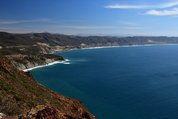 Fototapeta na wymiar Panorama of the Pacific coast seen from the high cliff of the Californian peninsula