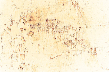 Vintage yellow background. Rough painted wall of aspen gold color. Imperfect plane of golden colored. Uneven old decorative toned backdrop of yellow tint. Texture of gold hue. Ornamental stony surface
