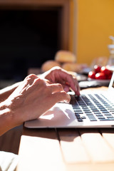 young man using a laptop outdoors