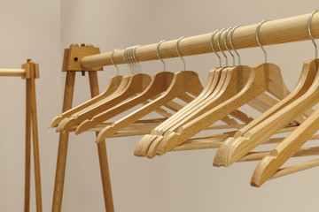empty wooden hangers for clothes