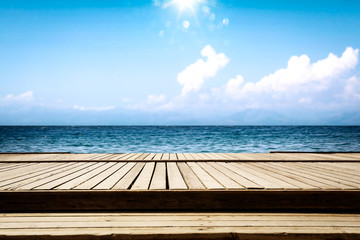 Summer wooden pier of free space for your deoration and ocean landscape with sun light. 