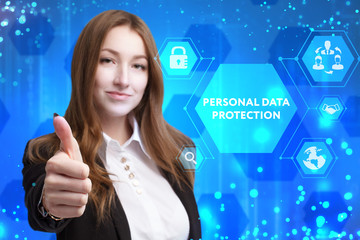 The concept of business, technology, the Internet and the network. A young entrepreneur working on a virtual screen of the future and sees the inscription: Personal data protection