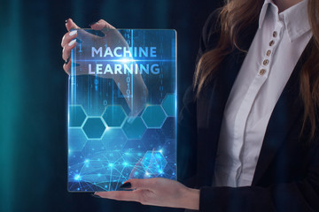 The concept of business, technology, the Internet and the network. A young entrepreneur working on a virtual screen of the future and sees the inscription: Machine learning