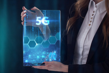 The concept of business, technology, the Internet and the network. A young entrepreneur working on a virtual screen of the future and sees the inscription: 5G
