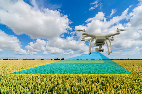 Multicopter Drone Flying Over Crops Field