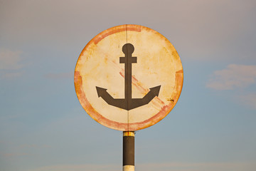 The road sign, anchor in a red circle