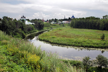 Fototapeta na wymiar View from the Kamenka River on the churches and monasteries