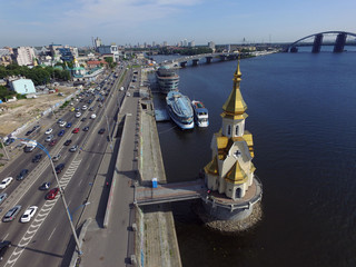 Fototapeta na wymiar St. Nicholas Wondermaker church on the water. Downtown (drone image). Kiev,Ukraine