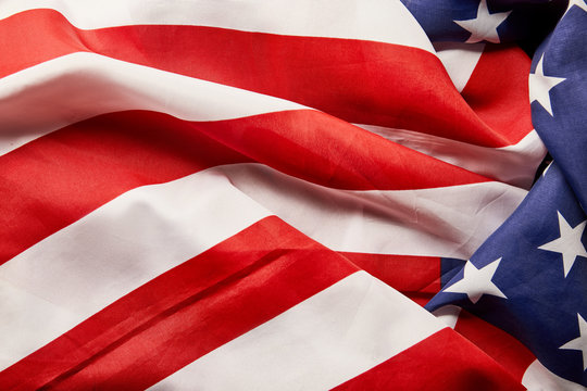 close up view of crumpled national american flag