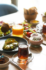 Turkish breakfast with various plates on a table