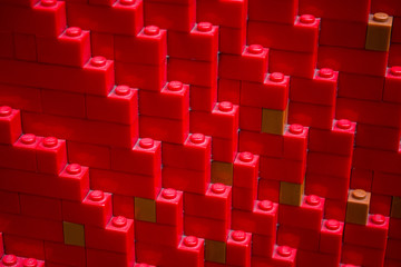 Background or texture from  the children's designer of red and yellow color. Different forms and lines.