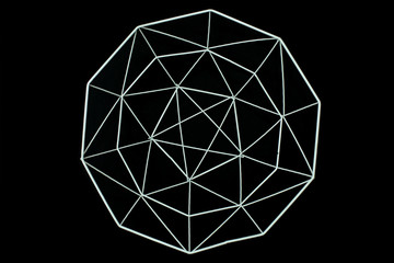 Metal wire decorative elements, basket, vase on a black background. MInimal concept. Beautiful abstract pattern of metal wire.