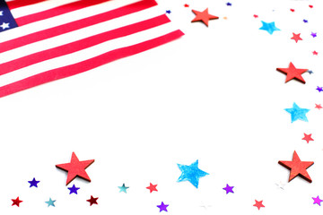 American independence day, celebration, patriotism and holidays concept - red and blue paper stars confetti and flag