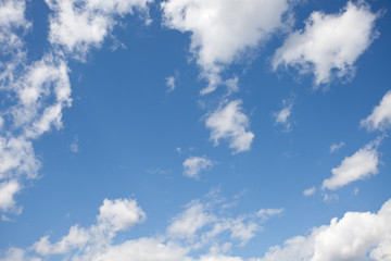 Clouds and blue sky background with copy space.