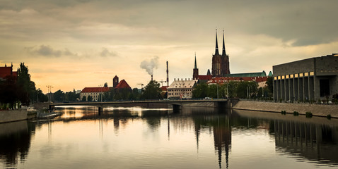 View of St. John the Baptist cathedral and other historic buildings in old town Wroclaw from Oder (Odra) river