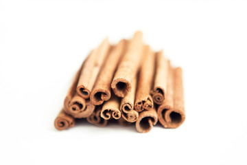 Set of cinnamon sticks on white background