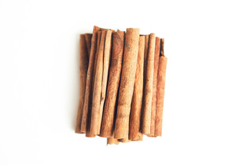 Set of cinnamon sticks on white background