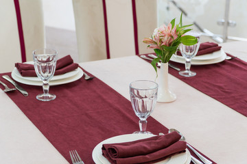 serving banquet table in a luxurious restaurant in red and white style