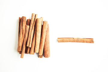 Set of cinnamon sticks on white background