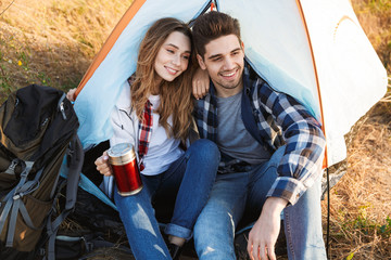 Loving couple outside in free alternative vacation