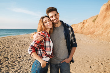 Young loving couple outside in free alternative vacation camping.