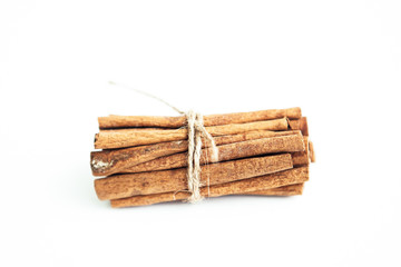 Set of cinnamon sticks on white background