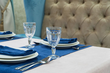 serving banquet table in a luxurious restaurant in blue and light style