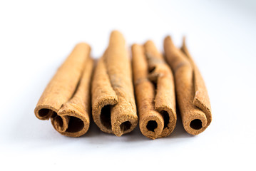 cinnamon sticks on white background
