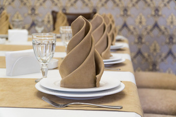 serving banquet table in a luxurious restaurant in beige and white style