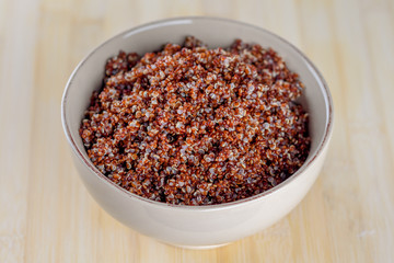 Cooked prep red quinoa in a bowl.Top view.