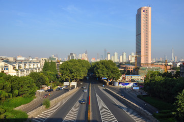 Nanjing City Skyline and Zhong Shan Dong Lu (East Zhongshan Road), viewed from Zhongshan Gate, Nanjing, Jiangsu Province, China.