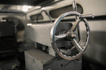 Tailstock of the lathe machine. Handle clamp on a metalworking lathe