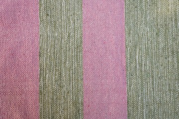 background of textile material. Fabric with natural texture. Fabric background pink and gray stripes