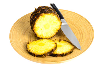 Sliced pineapple on light background