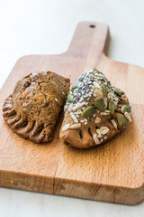 Homemade Salty Turkish Style Pastries with Cottage Cheese and Pumpkin Seeds / Salted Pogaca.