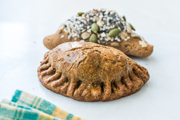 Homemade Salty Turkish Style Pastries with Cottage Cheese and Pumpkin Seeds / Salted Pogaca.