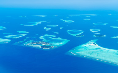 Maldives islands top view from airplane window