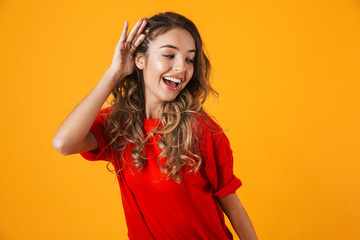 Portrait of a lovely cheerful young woman standing