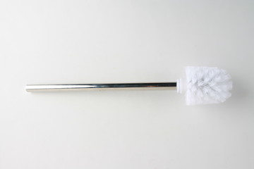 toilet brush in white and silver